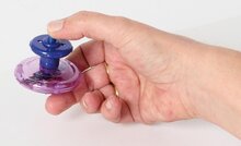 Vingertol met opwindmechaniek